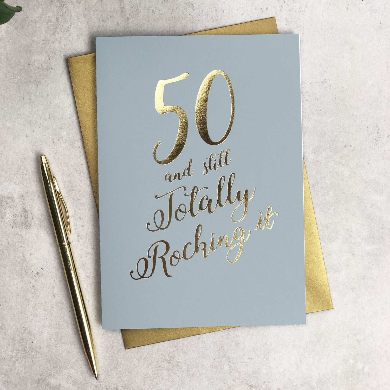 Funny 50 and Still Totalling Rocking It Birthday Card